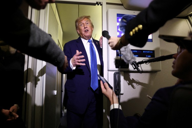President Trump speaking to reporters aboard Air Force One.