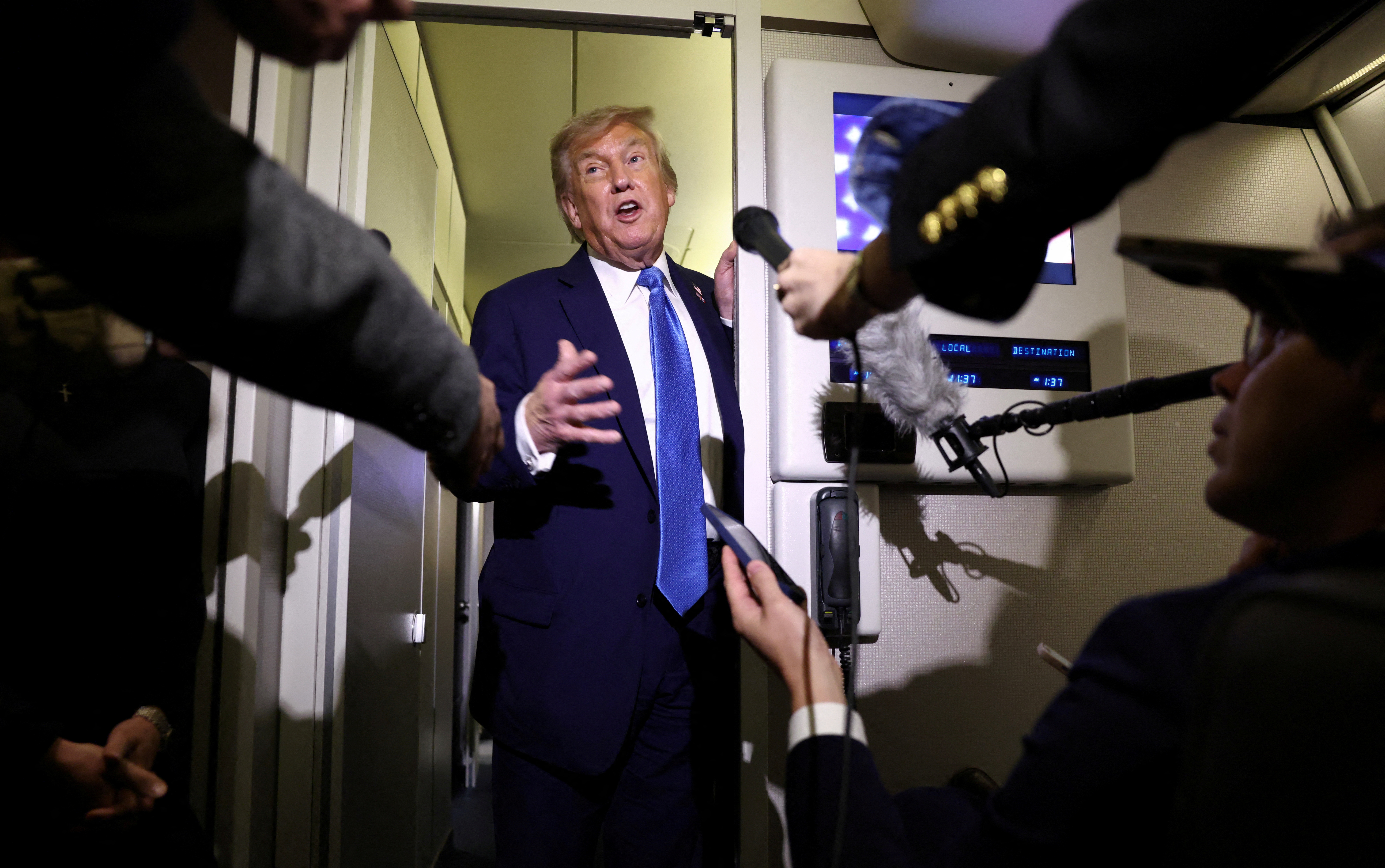 President Trump speaking to reporters aboard Air Force One.