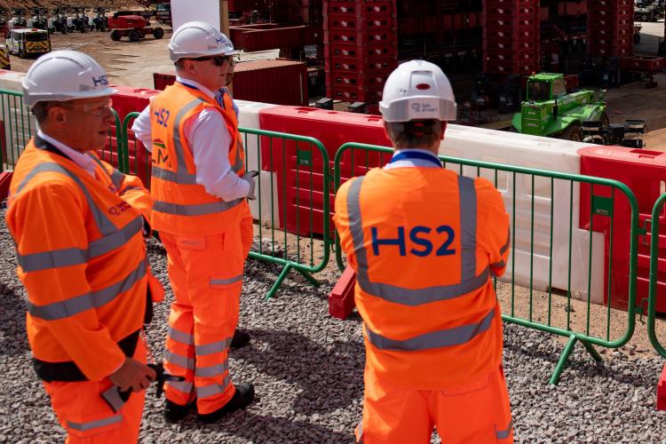 HS2 workers observing bridge installation at Interchange station.