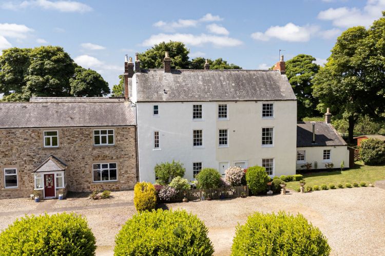 Aerial view of Kelloe South Hall, a three-story, four-bedroom house.