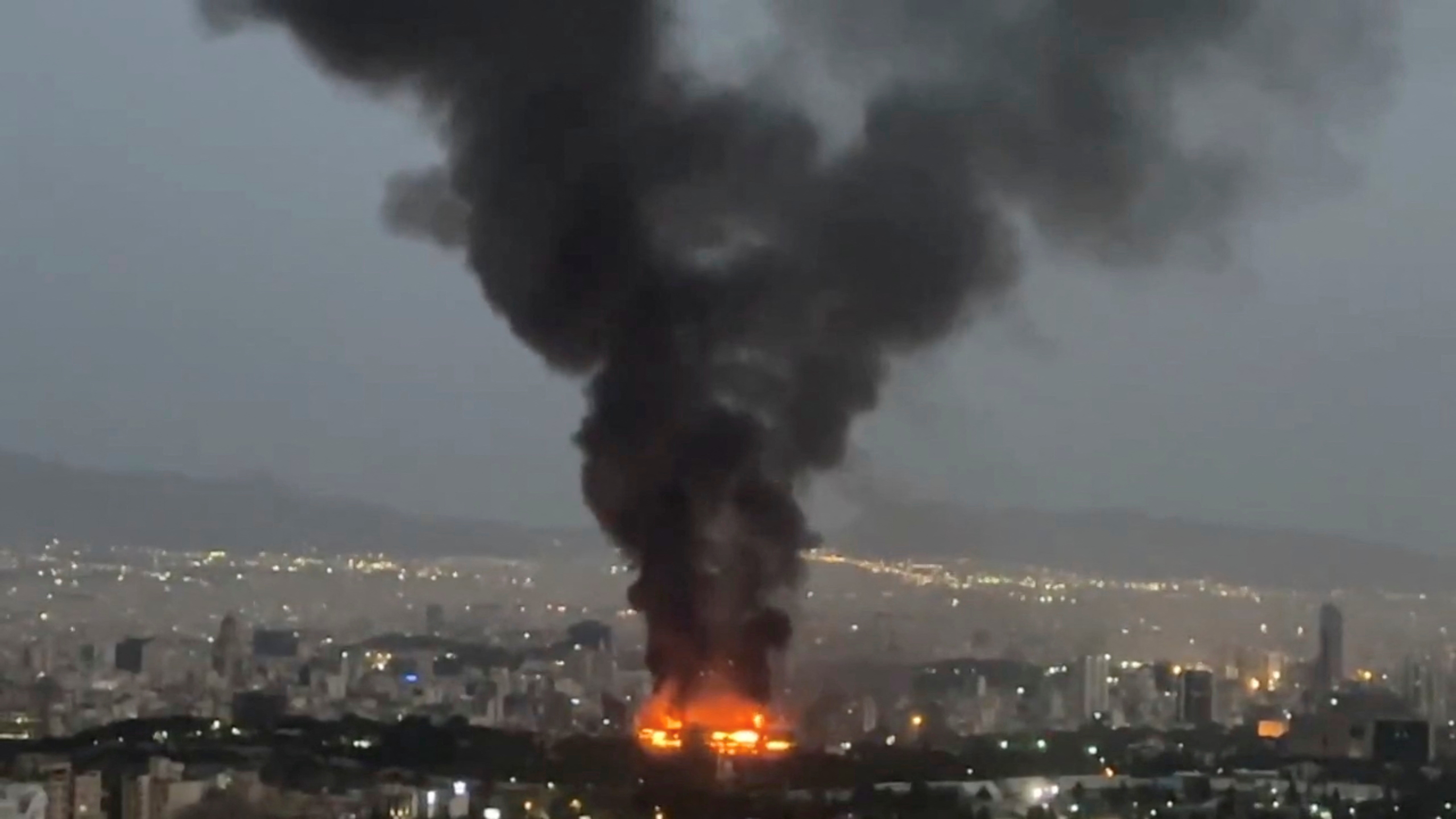 Smoke rises from an Israeli strike on Tehran