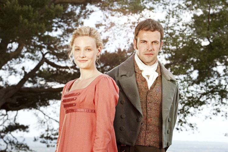 Romola Garai as Emma and Jonny Lee Miller as Mr. Knightley in period costume.