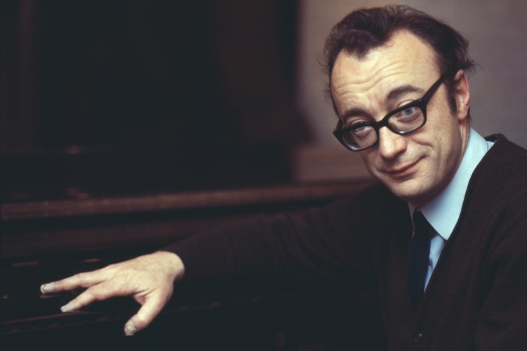 Alfred Brendel at a piano.