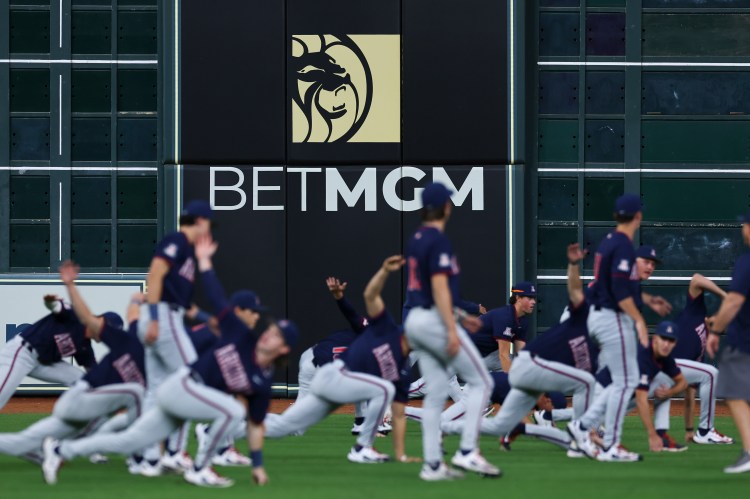 The Texas A&M Aggies baseball team warming up before the Astros Foundation College Classic in Houston