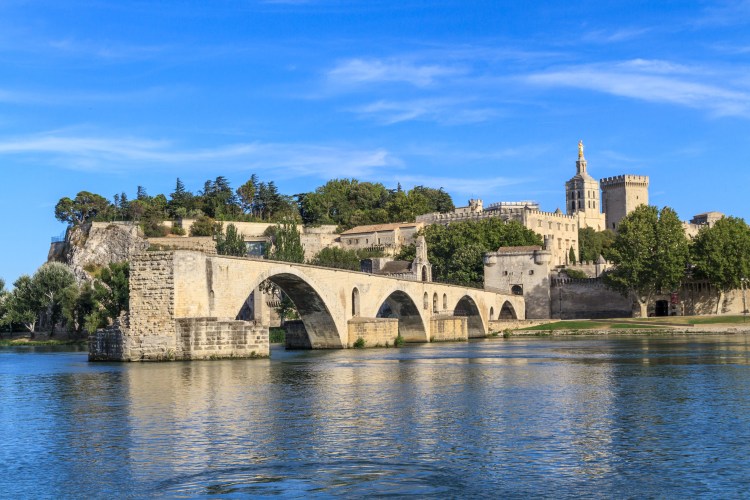 Avignon Bridge and the Palais des Papes in Provence, France.