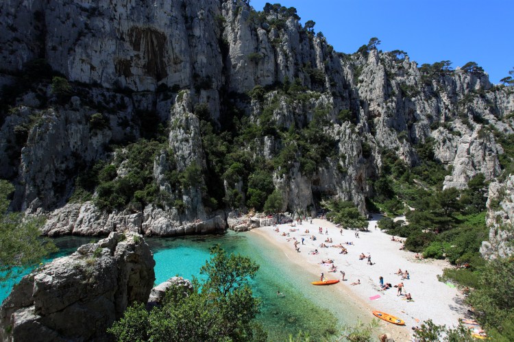 Beach surrounded by cliffs in Cassis, France.