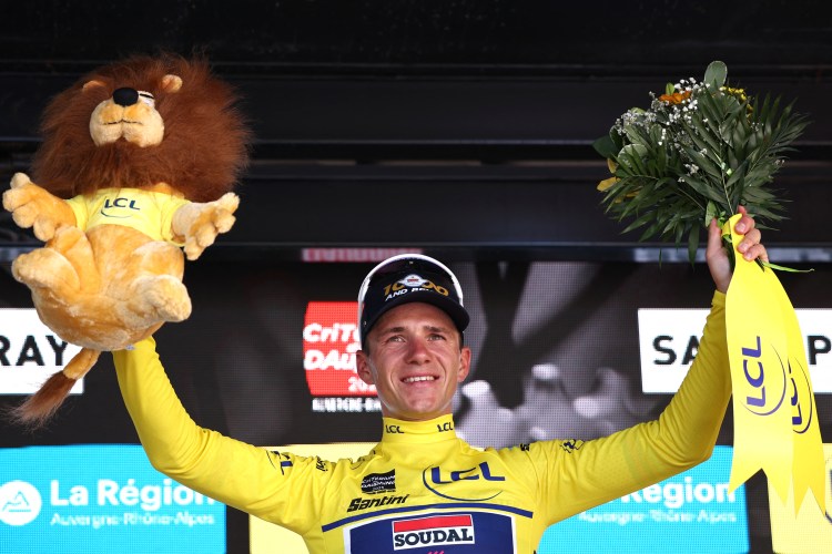 Remco Evenepoel celebrates winning the Criterium du Dauphine cycling race.