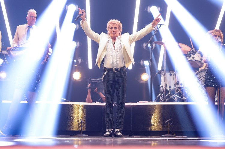 Rod Stewart performing onstage at the American Music Awards.