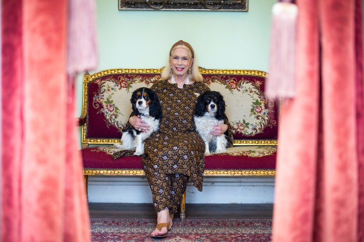 Lady Colin Campbell and her two Cavalier King Charles spaniels at her home Castle Goring, Worthing, West Sussex