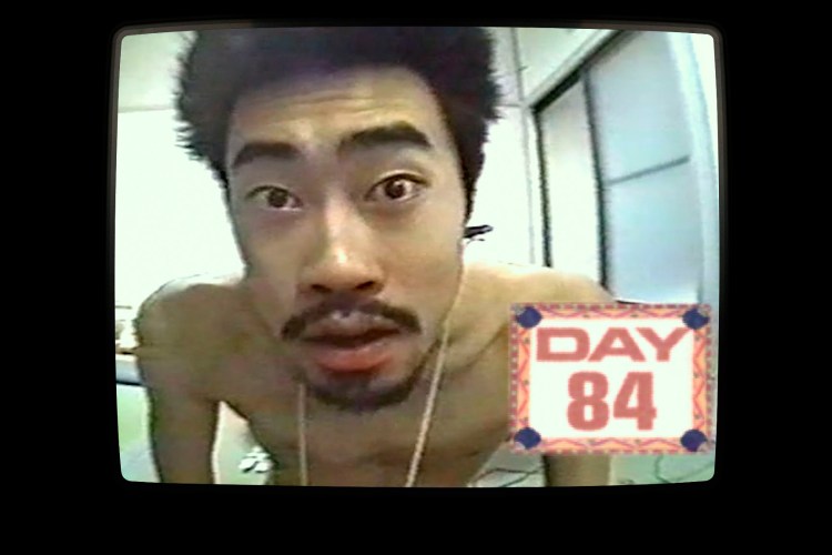 Close-up video still of Nasubi, a contestant on The Contestant, on day 84.