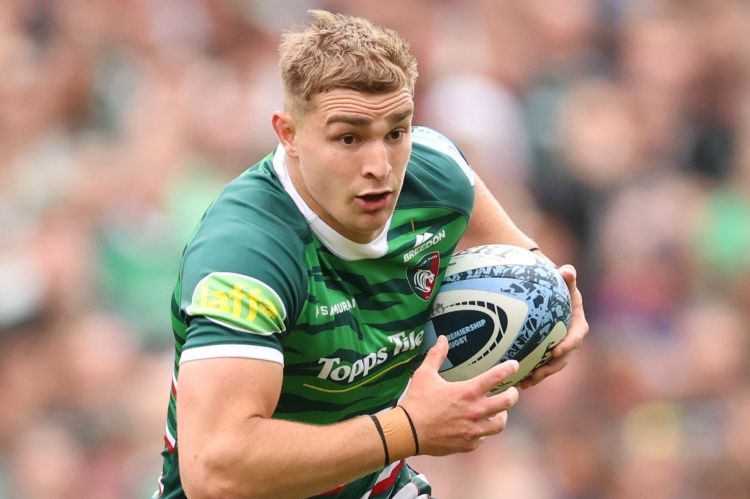 Jack van Poortvliet of Leicester Tigers running with the rugby ball.