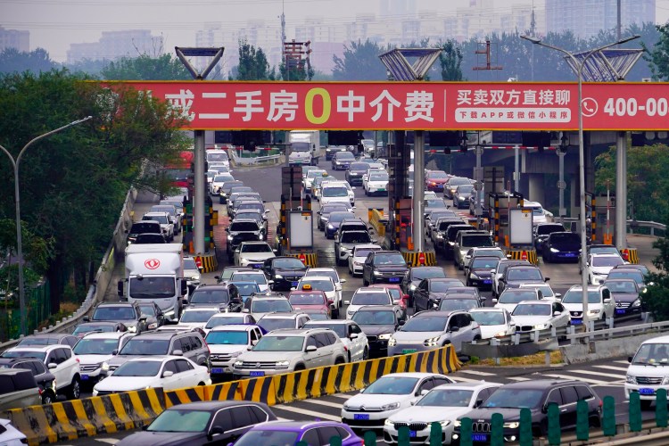 Traffic jam at an expressway toll booth in Beijing, China.