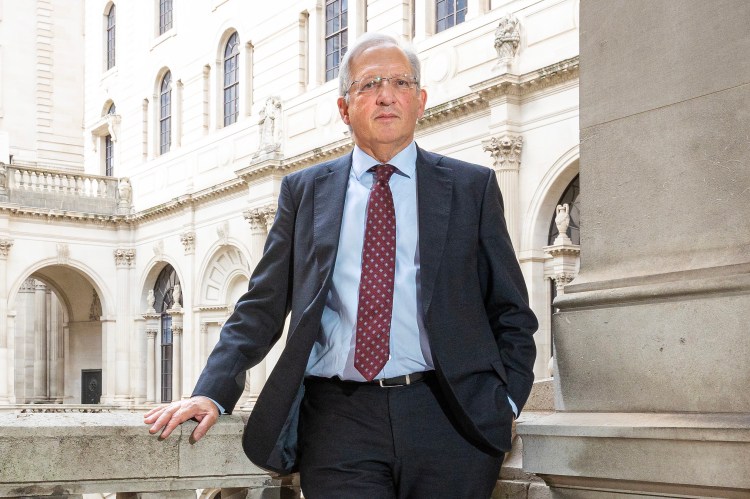 Sir Jon Cunliffe, Deputy Governor of the Bank of England, standing outside the Bank of England.